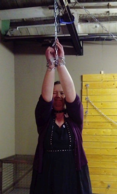 Victoria Blisse chained up - suspension bondage