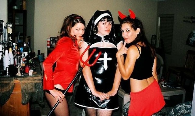 Sexy halloween costume displayed by three women