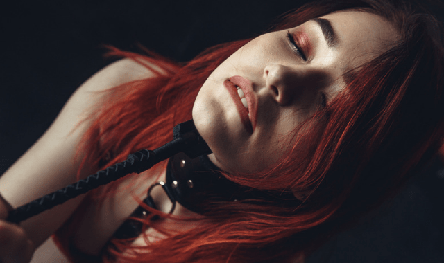 Woman living out a submissive fantasy