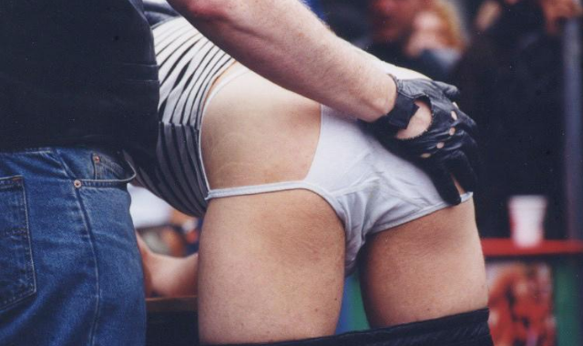 Image of hand spanking. Impact play. 