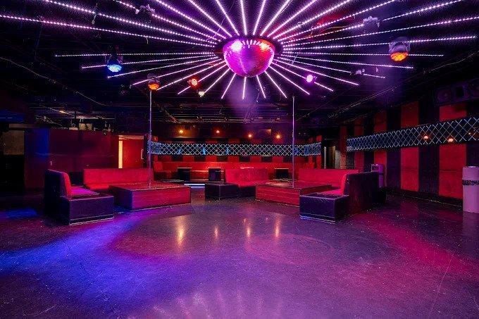 A dynamic, social atmosphere at Miami Velvet, where consent and mutual respect set the tone for playful exploration.